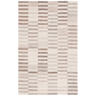 Tapis géométrique ivoire / beige en coton et jute touffeté à la main Delfida