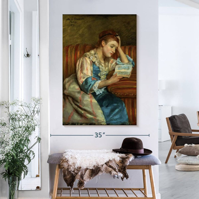 Duffee sur un canapé rayé, H 39 po x l 26 po