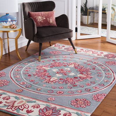Crusita Hand Tufted Wool Floral Rug