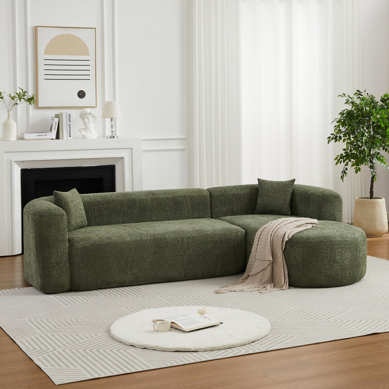 Canapé modulaire modulaire en L avec dossier incurvé, tissu chenille et confort moelleux pour les espaces de vie modernes.