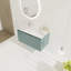 Meuble-lavabo flottant de 36 pouces avec lavabo en résine en forme de goutte et beaucoup de rangement, parfait pour les salles de bain modernes.-126233391-126233389