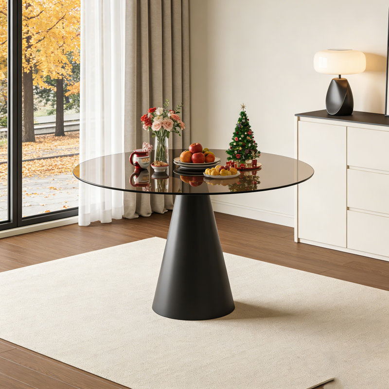 Table de salle à manger ronde en verre trempé avec pieds en acier au carbone, parfaite pour les petits espaces et l'esthétique moderne