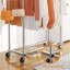 Simple and Stylish Double Rod Movable Clothes Rack with 4 Hooks for Convenient Hanging