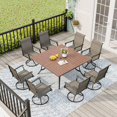 Patio Dining Set with Swivel PVC-Coated Polyester Chairs and 59" Square Dining Table by Red Barrel Studio