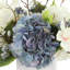 Hydrangea, Berris and Magnolia Arranged in a Ceramic Pot