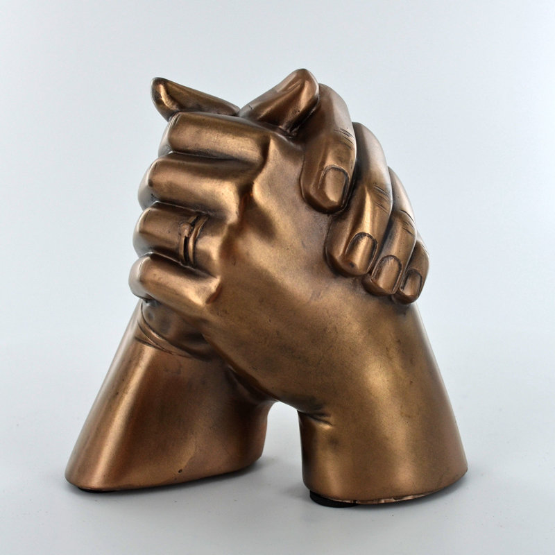Tergel Holding Hands Anniversary Sculpture