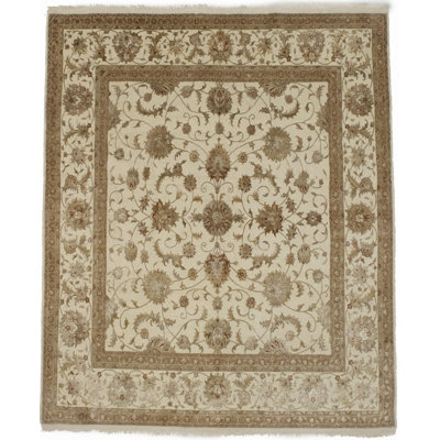 Tapis beige à motif floral Leming