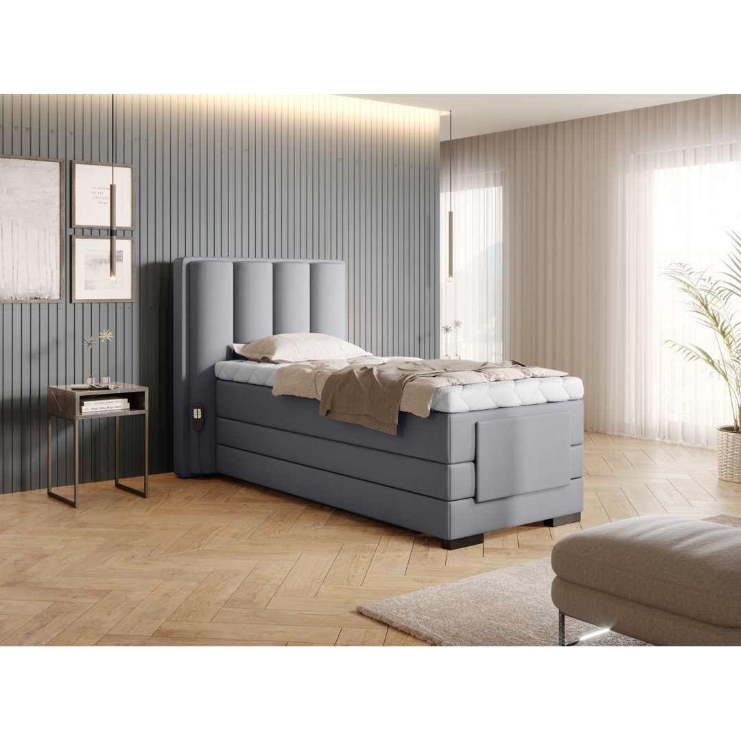 Elektrisch verstellbares Boxspringbett Arrigo mit Topper