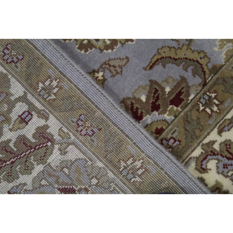 Tapis bleu et ivoire de haute qualité noué à la main