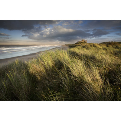 Bamburgh Castle At Sunset by Blackbeck - Wrapped Canvas Print