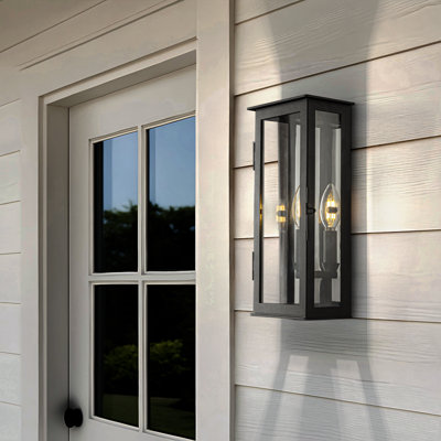 1 lumière H12 po Applique murale d'extérieur noir mat moderne avec capteur de crépuscule à l'aube Simplicity avec abat-jour en verre transparent pour jardin de véranda 				