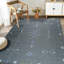 Tapis gris à tissage plat-87377960