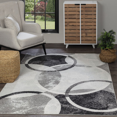 Blannie Geometric Machine Tufted Area Rug