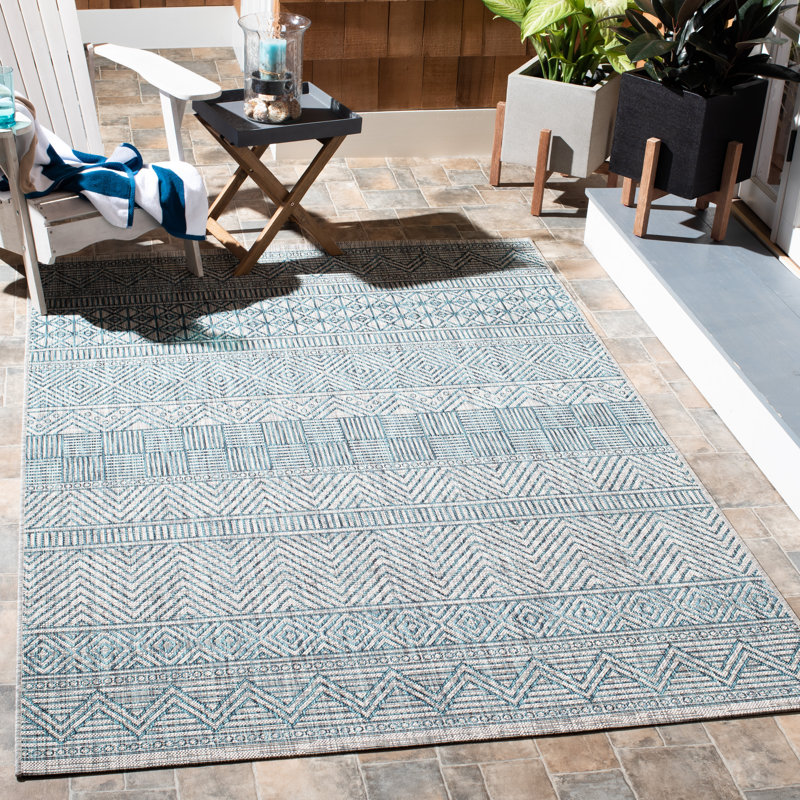 Tapis bleu sarcelle intérieur / extérieur Johansson, Rectangle 5 pi 3 po x 7 pi 7 po