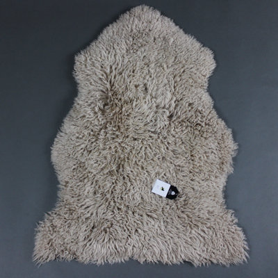 Radhika Curly Sheepskin Rug in Beige