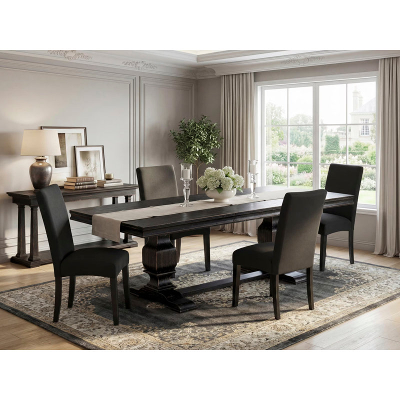 Cet ensemble de cuisine 5 pièces se compose d'une table et de 4 chaises parsons en tissu de lin noir avec dossier rembourré au fini noir sablé.