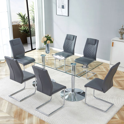 Ensemble de table et de chaises. Table en verre trempé de 71 pouces x 35,4 pouces, chaises en polyuréthane gris foncé de haute qualité avec pieds en métal arqués, table de cuisine moderne et ensemble de mobilier de salle à manger 6 places pour les réunions de famille.