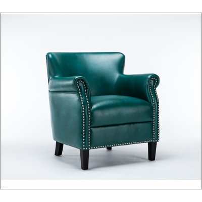 Élégant fauteuil club bleu sarcelle avec revêtement en similicuir confortable et structure en bois durable, parfait pour les salons modernes.