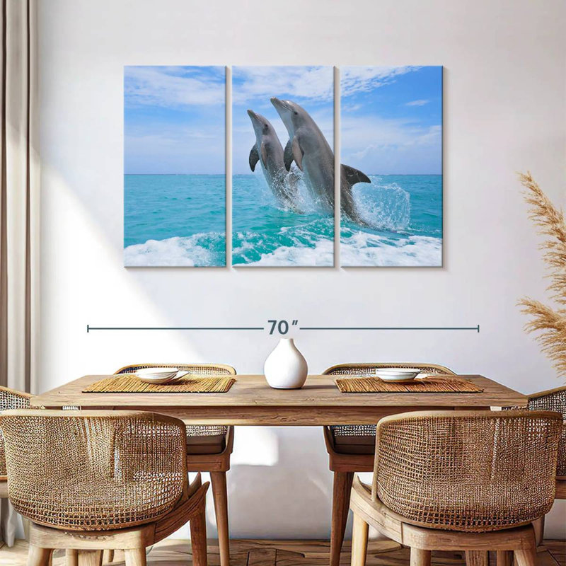 Bramph dauphins jouant en mer, H 36 po x l 57 po