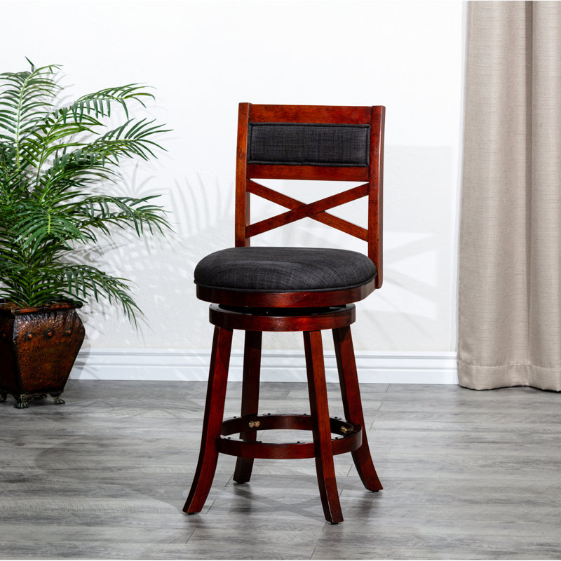 Counter Height Swivel Stool, Cherry Finish, Charcoal Fabric Seat & Charcoal. Hardwood Construction. 360-Degree Rotation. Padded Seat. Stable Flared Legs. Simple Assembly Required