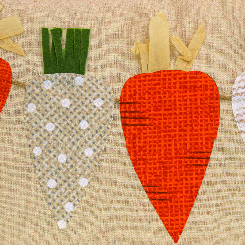 National Tree Company 18"x10" String of Carrots Easter Pillow