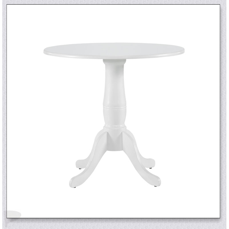 Table ronde à finition blanche avec base en piédestal en bois, parfaite pour les repas de style campagnard décontracté et les petits espaces