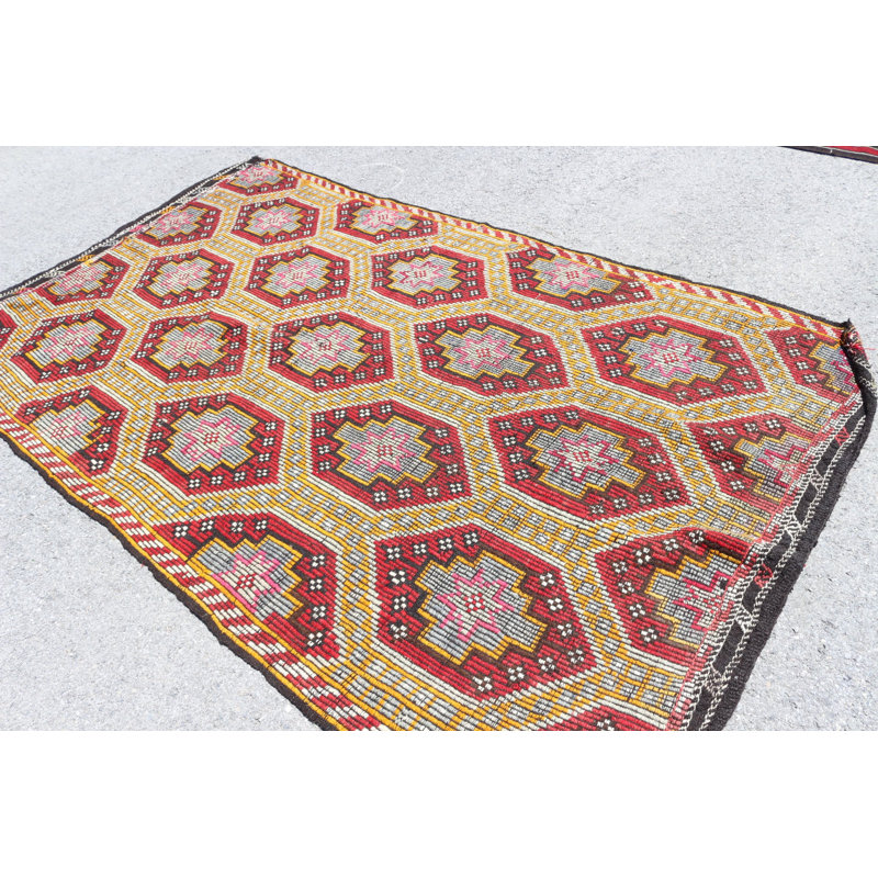 Tapis turc kilim tissé à la main dans un motif géométrique rouge vif pour une touche de décoration bohémienne