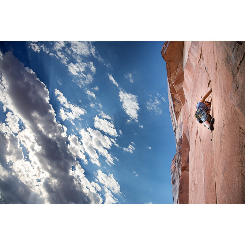 Young Man Climbing by Grandriver, 8" H x 12" W