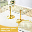 Ensemble table et chaises 8 places : table en verre trempé de 180 x 90 cm, chaises en plastique transparent avec pattes en métal doré, montage facile, design gain de place.