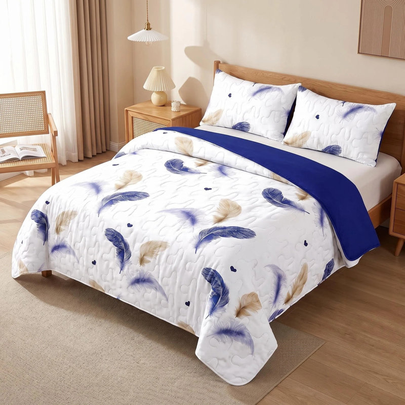Ensemble de couette réversible 3 pièces en microfibre bleu marine et or à plumes avec 2 taies d'oreiller