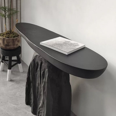 Wabi-sabi style simple black console table