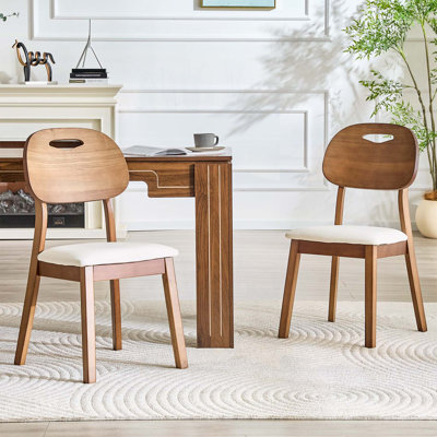 Chaise d'appoint avec coussins en tissu respirant et dossiers évidés pour un usage domestique