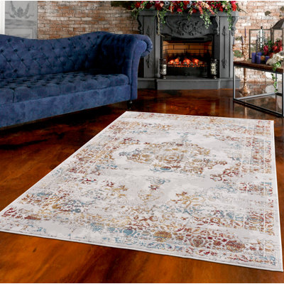 Tapis décoratif abstraite beige/rouge/bleu Tarrance