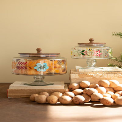 SET OF TWO FOOTED GLASS JARS W WOOD TOPS & PAINTED DETAIL