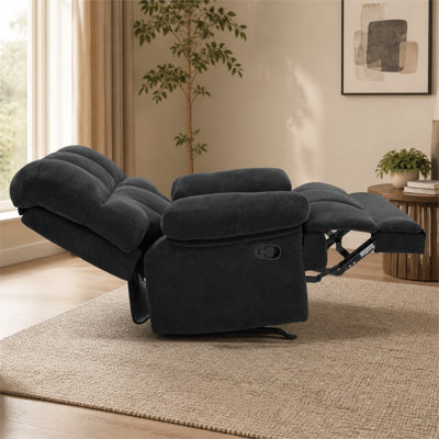 This modern, textured fabric manual rocking chair is sturdy and perfect for relaxing in the living room.