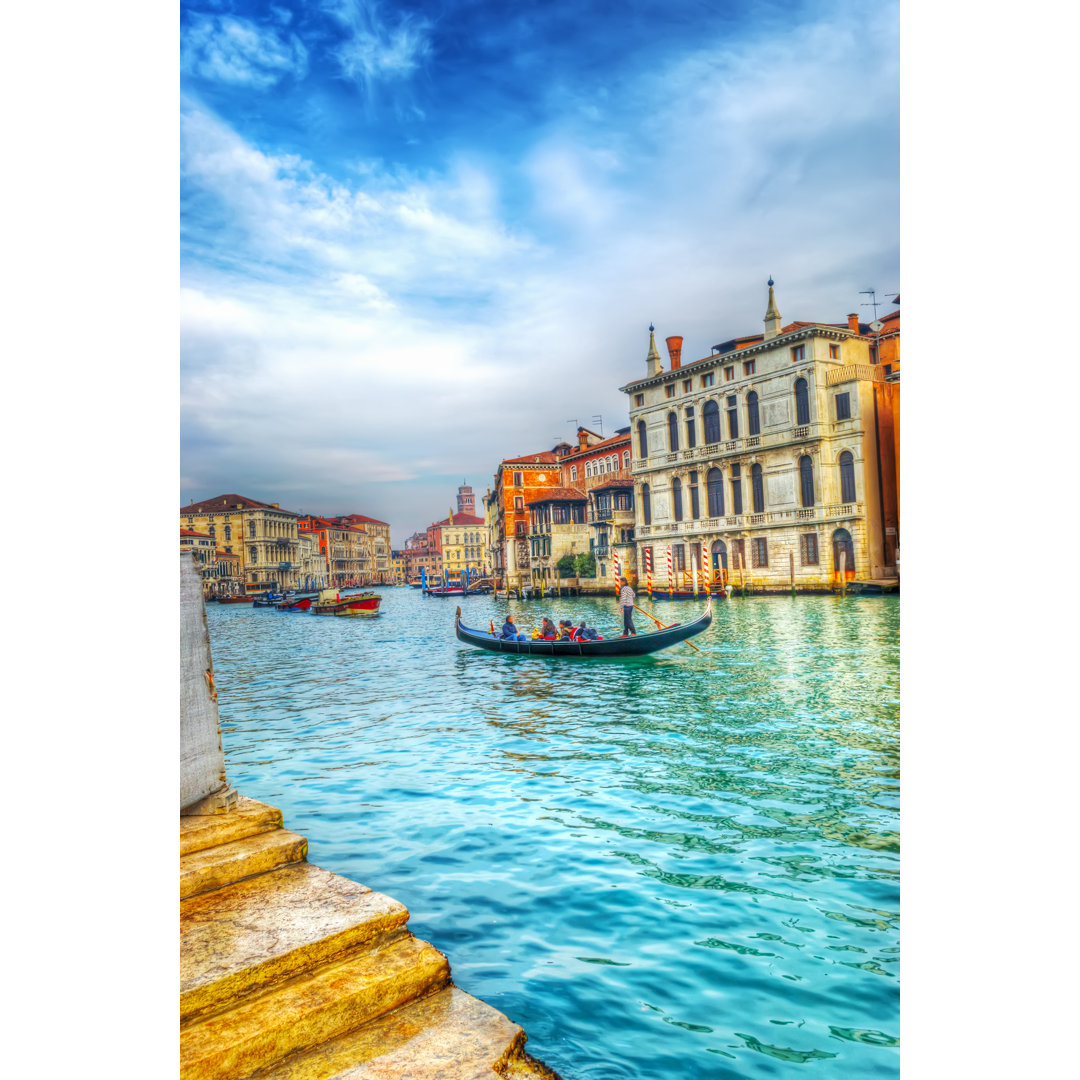 Gondolier And Tourists In Venice Grand Canal by AlKane - Wrapped Canvas Print