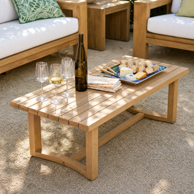 Table basse d'extérieur moderne en bois d'acacia avec plateau à lattes et base robuste