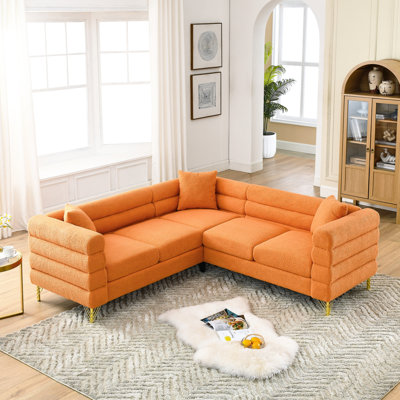 81.5-Inch L-Shaped Sectional Couch, 5 Corner For Living Spaces. Streamline Modern Design With Subtle Bends And Long Horizontals. Solid Wood Metal Framework. 3 Cushions Pillows. Orange Colouring. 250