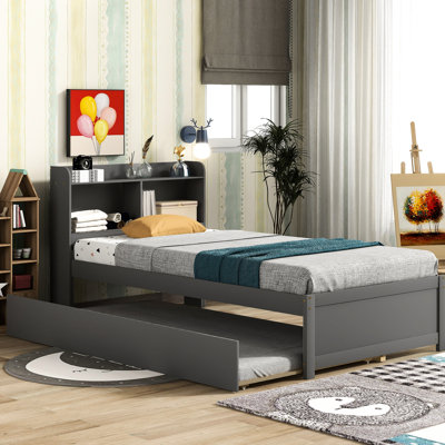Lit simple avec bibliothèque et lit gigogne gris - Optimisez la disposition de votre chambre à coucher