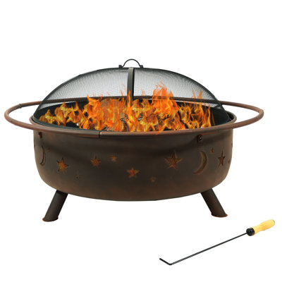 42" round wood burning outdoor fireplace made of steel with a bronze finish and featuring a cosmic pattern spark screen