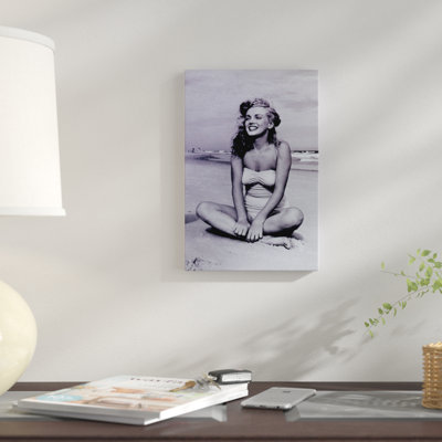 " A Young, Smiling Marilyn Monroe Sitting On The Beach " Graphic Art