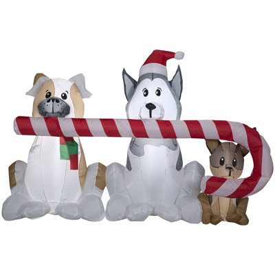 Chiots gonflables de Noël avec grande canne de bonbon