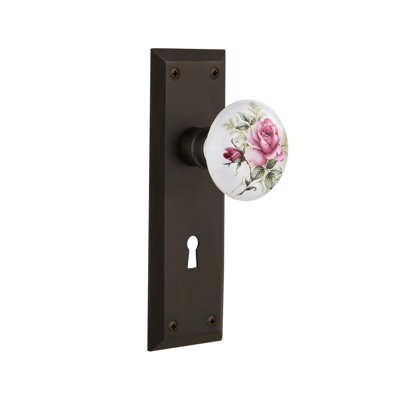 Plaque New York avec trou de serrure décoratif et bouton de porte en porcelaine blanche
