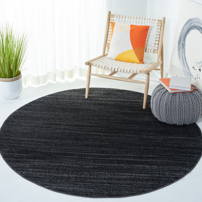 Sarang Black/Ivory Area Rug