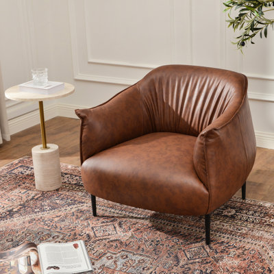 Fauteuil demi-tonneau en faux cuir touffeté à la main Arloh