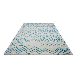 Jacoby Chevron Ivory/Turquoise Area Rug
