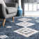 Hassan Geometric Blue Area Rug