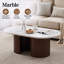 Table basse contemporaine en marbre ovale avec piédestal cannelé