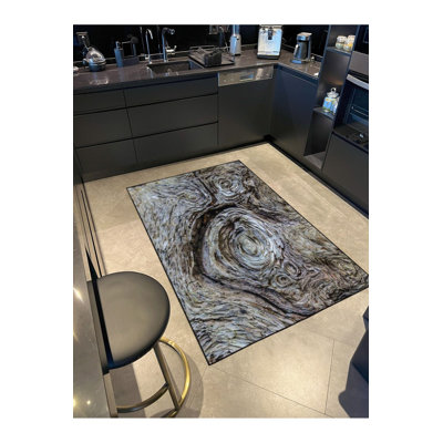 Tapis tissé et lavable Muddied