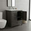 Meuble-lavabo de ferme gris de 30 pouces avec lavabo encastré en céramique et robinet, porte de grange et unité de rangement séparée.